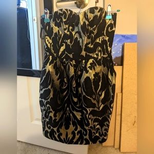 Mini black and gold strapless party dress